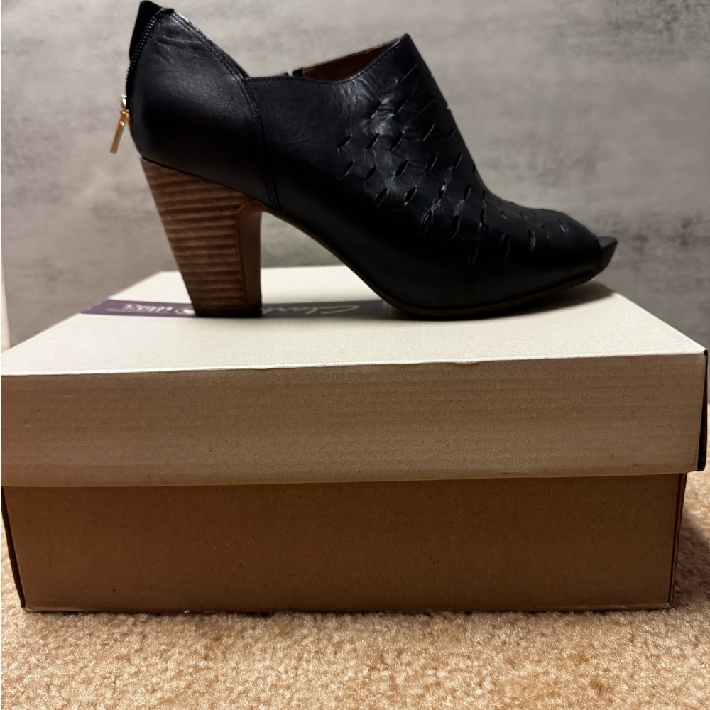 Clarks Sophisticated Black Heeled Boots with Textured Detailing